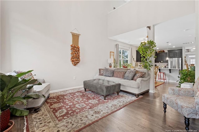 244 Great Enos Path, Hillsborough, NC 27278 - living room featuring wood finished floors and a towering ceiling