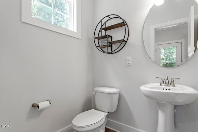 1304 Castlebay Rd, Durham, NC 27703 - bathroom with baseboards and toilet