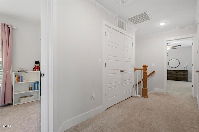 1304 Castlebay Rd, Durham, NC 27703 - hall featuring an upstairs landing, carpet floors, crown molding, and attic access