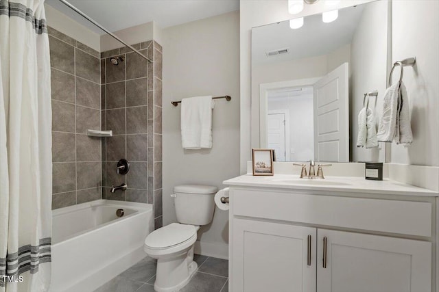 1304 Castlebay Rd, Durham, NC 27703 - full bath featuring shower / bath combo, vanity, and tile patterned flooring