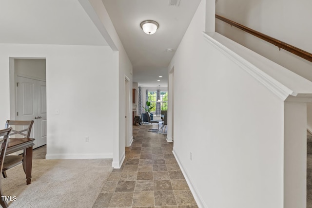 120 Misty Grove Trl, Franklinton, NC 27525 - corridor with light stone finish flooring and stairs