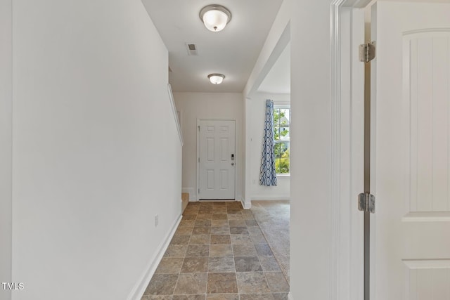 120 Misty Grove Trl, Franklinton, NC 27525 - hall featuring stone finish floors and baseboards