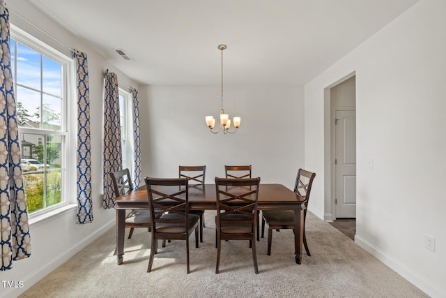 120 Misty Grove Trl, Franklinton, NC 27525 - dining area featuring a chandelier and carpet floors