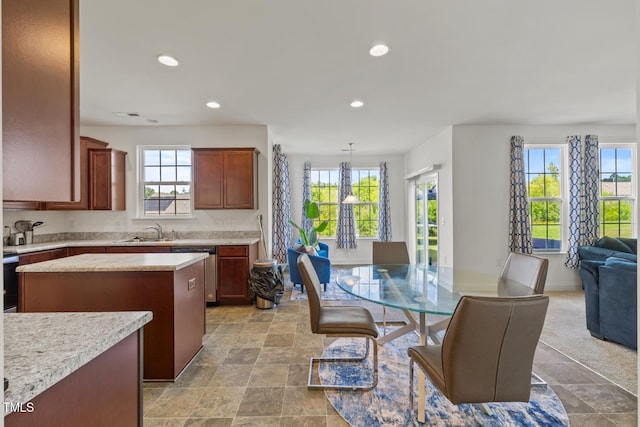 120 Misty Grove Trl, Franklinton, NC 27525 - kitchen featuring dishwasher, recessed lighting, open floor plan, stone finish flooring, and a kitchen island