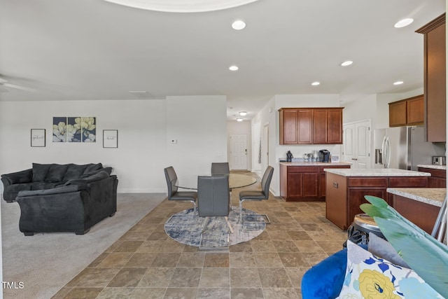 120 Misty Grove Trl, Franklinton, NC 27525 - kitchen featuring open floor plan, stainless steel fridge, light countertops, a center island, and recessed lighting