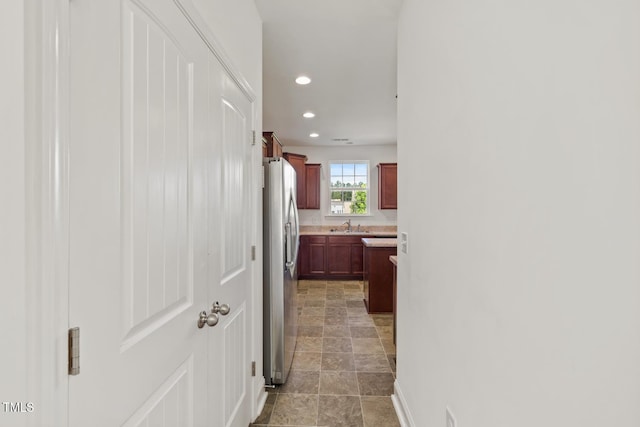 120 Misty Grove Trl, Franklinton, NC 27525 - hall featuring recessed lighting and light stone finish floors