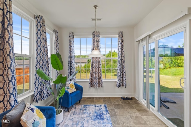 120 Misty Grove Trl, Franklinton, NC 27525 - living area with healthy amount of natural light and stone finish floors