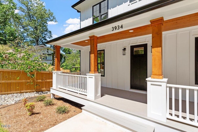 3934 Old Chapel Hill Rd, Durham, NC 27707 - entrance to property featuring a porch and board and batten siding