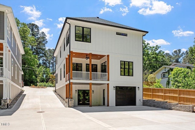 3934 Old Chapel Hill Rd, Durham, NC 27707 - view of front of home with a garage, a balcony, and driveway