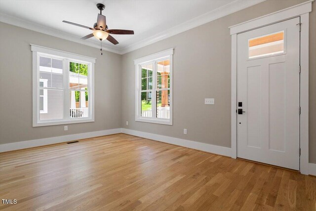3934 Old Chapel Hill Rd, Durham, NC 27707 - entryway with crown molding, light wood finished floors, and ceiling fan