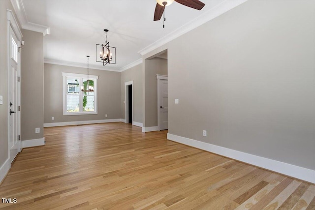 3934 Old Chapel Hill Rd, Durham, NC 27707 - empty room with a chandelier, crown molding, light wood-style flooring, and a ceiling fan