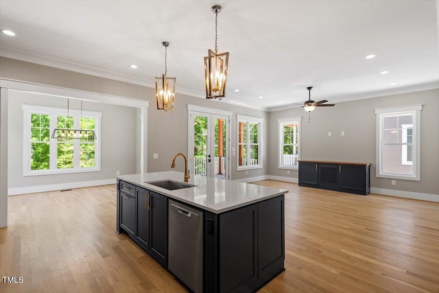 3934 Old Chapel Hill Rd, Durham, NC 27707 - kitchen with stainless steel dishwasher, a chandelier, open floor plan, dark cabinetry, and crown molding