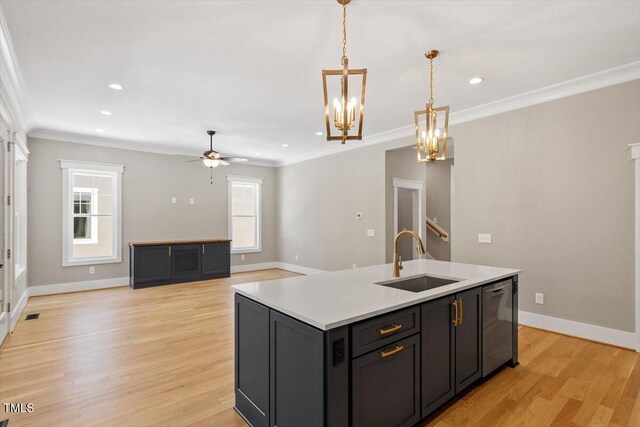 3934 Old Chapel Hill Rd, Durham, NC 27707 - kitchen with dishwasher, ornamental molding, ceiling fan, light wood-type flooring, and light countertops