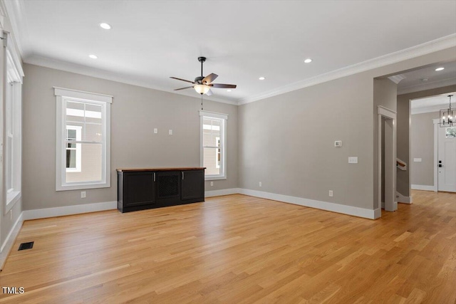 3934 Old Chapel Hill Rd, Durham, NC 27707 - unfurnished living room featuring ornamental molding, ceiling fan, light wood finished floors, recessed lighting, and a chandelier