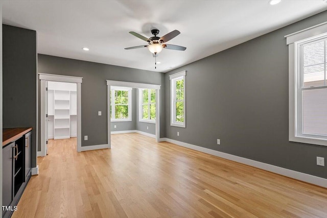 3934 Old Chapel Hill Rd, Durham, NC 27707 - unfurnished living room featuring recessed lighting, light wood finished floors, and a ceiling fan