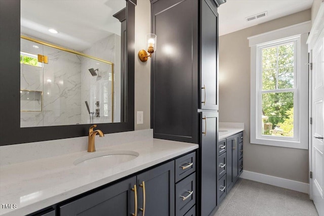 3934 Old Chapel Hill Rd, Durham, NC 27707 - bathroom featuring vanity, a marble finish shower, and tile patterned floors