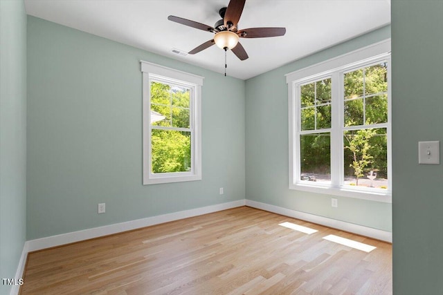 3934 Old Chapel Hill Rd, Durham, NC 27707 - empty room with plenty of natural light, wood finished floors, and a ceiling fan