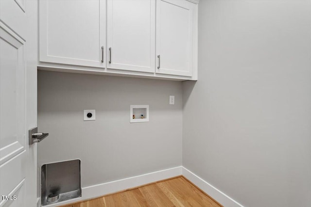 3934 Old Chapel Hill Rd, Durham, NC 27707 - laundry room featuring cabinet space, light wood finished floors, electric dryer hookup, and washer hookup