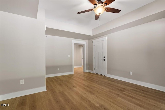 3934 Old Chapel Hill Rd, Durham, NC 27707 - empty room with wood finished floors and a ceiling fan