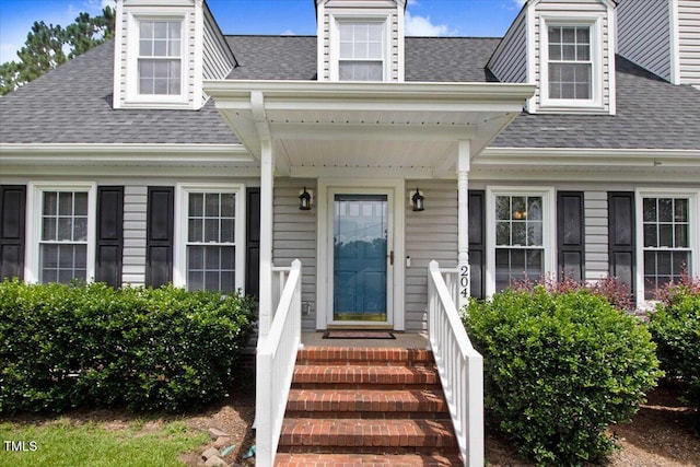 204 Paul Pl, Goldsboro, NC 27534 - view of exterior entry with roof with shingles