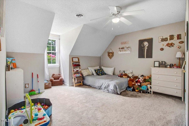 204 Paul Pl, Goldsboro, NC 27534 - carpeted bedroom with lofted ceiling, ceiling fan, and a textured ceiling