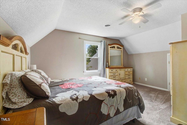 204 Paul Pl, Goldsboro, NC 27534 - carpeted bedroom featuring vaulted ceiling, a textured ceiling, and ceiling fan