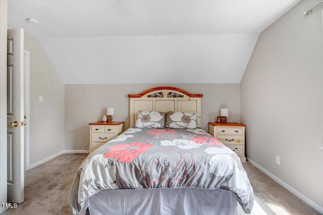 204 Paul Pl, Goldsboro, NC 27534 - carpeted bedroom featuring vaulted ceiling and baseboards