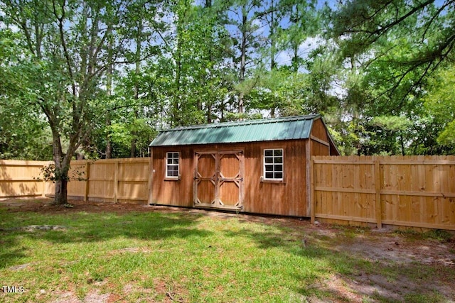 204 Paul Pl, Goldsboro, NC 27534 - view of shed with a fenced backyard