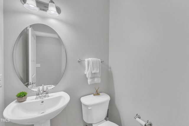 413 Westfalen Dr, Cary, NC 27519 - bathroom featuring a sink and toilet