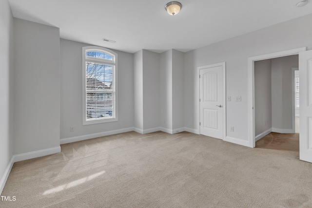 413 Westfalen Dr, Cary, NC 27519 - unfurnished bedroom featuring carpet flooring and baseboards