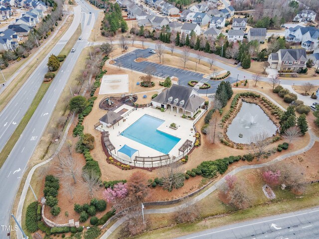413 Westfalen Dr, Cary, NC 27519 - aerial view of property and surrounding area with a pool and nearby suburban area