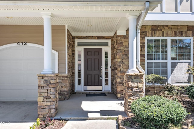 413 Westfalen Dr, Cary, NC 27519 - entrance to property featuring a porch and stone siding