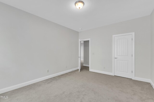 413 Westfalen Dr, Cary, NC 27519 - unfurnished bedroom with light colored carpet