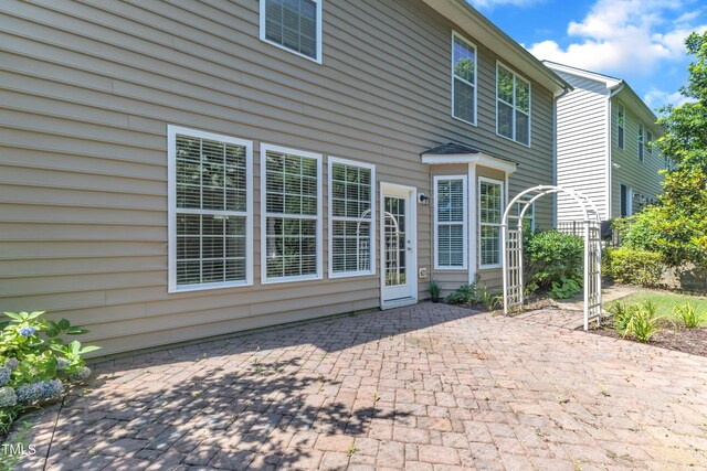 413 Westfalen Dr, Cary, NC 27519 - back of property with a patio area