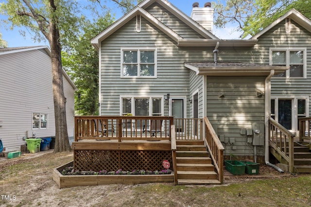 1815 Crystal Downs Ln, Raleigh, NC 27604 - back of house featuring a chimney and a deck