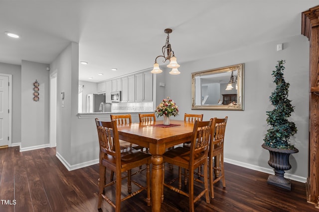 1815 Crystal Downs Ln, Raleigh, NC 27604 - dining room featuring dark wood-style floors and recessed lighting