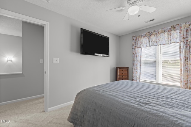 1815 Crystal Downs Ln, Raleigh, NC 27604 - bedroom featuring carpet flooring, a textured ceiling, and ceiling fan