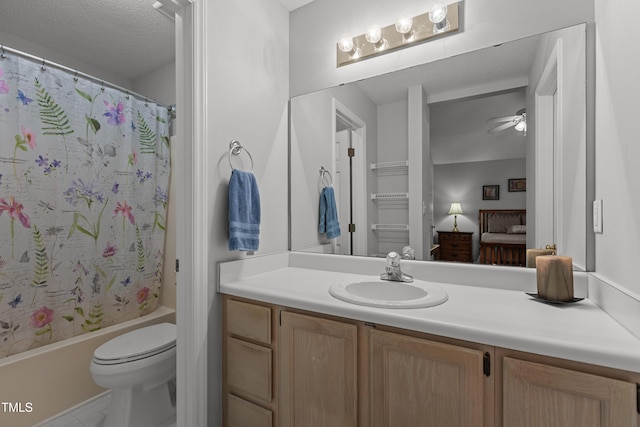 1815 Crystal Downs Ln, Raleigh, NC 27604 - bathroom featuring vanity, shower / bath combo, connected bathroom, a ceiling fan, and a textured ceiling