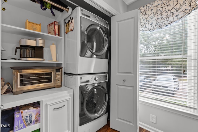1815 Crystal Downs Ln, Raleigh, NC 27604 - laundry area featuring stacked washer / drying machine and healthy amount of natural light