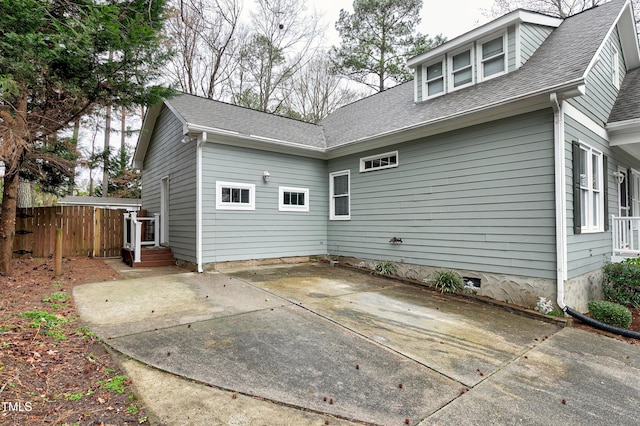 1821 Kelly Glen Dr, Apex, NC 27502 - rear view of property featuring a patio area and a shingled roof