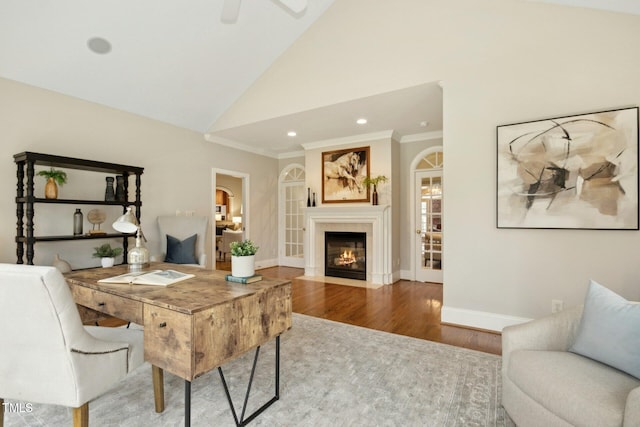 5204 Winter Holly Ct, Raleigh, NC 27606 - living room with wood finished floors, a fireplace with flush hearth, recessed lighting, a ceiling fan, and lofted ceiling