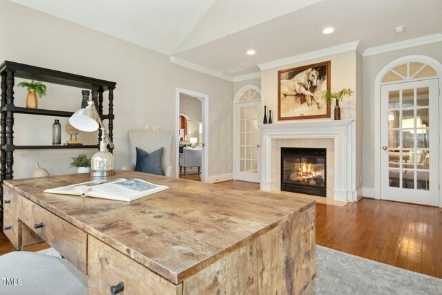 5204 Winter Holly Ct, Raleigh, NC 27606 - living room featuring wood finished floors, ornamental molding, recessed lighting, a fireplace with flush hearth, and lofted ceiling