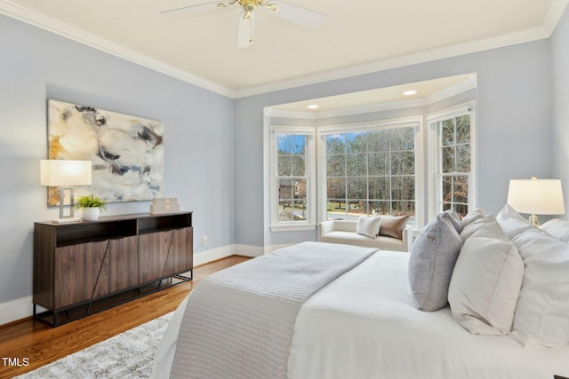 5204 Winter Holly Ct, Raleigh, NC 27606 - bedroom featuring crown molding, wood finished floors, and ceiling fan