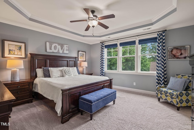 508 Morning Oaks Dr, Holly Springs, NC 27540 - bedroom featuring a tray ceiling, ornamental molding, carpet floors, and a ceiling fan