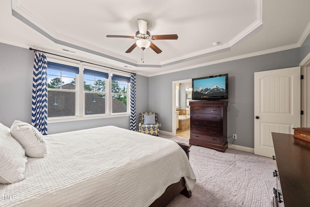 508 Morning Oaks Dr, Holly Springs, NC 27540 - bedroom with a tray ceiling, crown molding, light colored carpet, connected bathroom, and ceiling fan