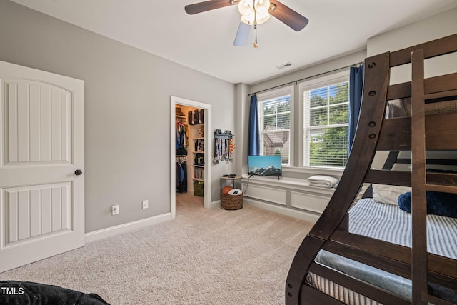508 Morning Oaks Dr, Holly Springs, NC 27540 - bedroom featuring carpet floors, a walk in closet, a closet, and ceiling fan
