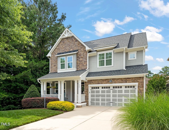 508 Morning Oaks Dr, Holly Springs, NC 27540 - craftsman house with stone siding, a porch, driveway, an attached garage, and a shingled roof