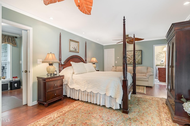 106 Scuppernong Ct, West End, NC 27376 - bedroom with wood finished floors, crown molding, and recessed lighting