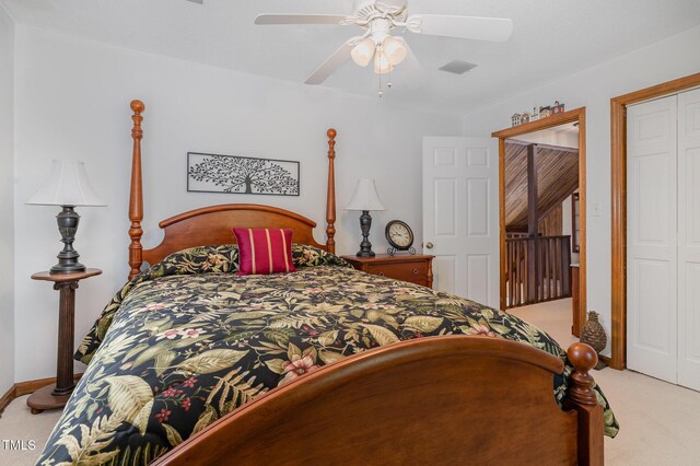 106 Scuppernong Ct, West End, NC 27376 - bedroom with light carpet, a closet, and a ceiling fan