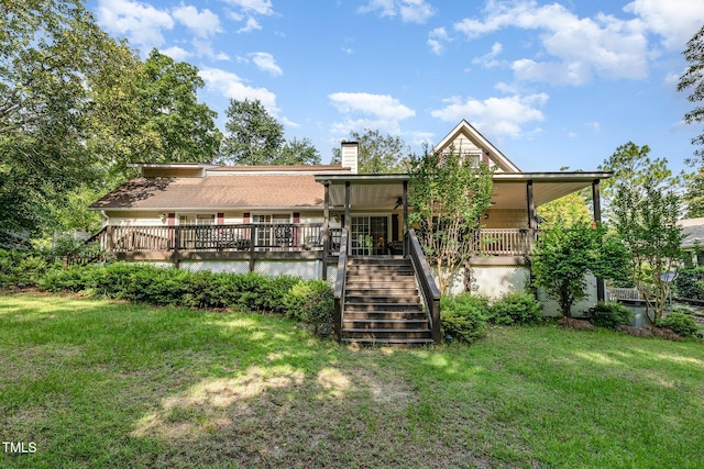 106 Scuppernong Ct, West End, NC 27376 - rear view of house featuring stairway, a yard, and a chimney